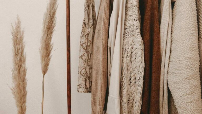A single top hanging on a minimal clothes rail