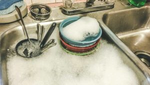 The Dishes Aren’t Really the Problem. Here’s What Your Sink Fight Is Actually About
